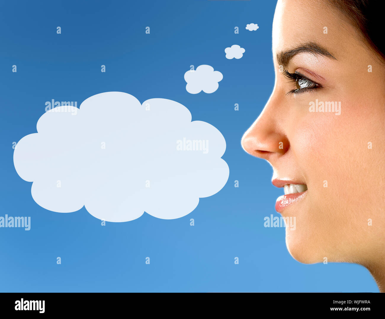 Portrait of a young and beautiful woman in blue Stock Photo - Alamy