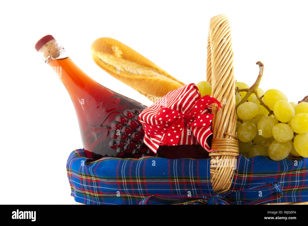 basket for picnic full with wine bread and fruit Stock Photo - Alamy