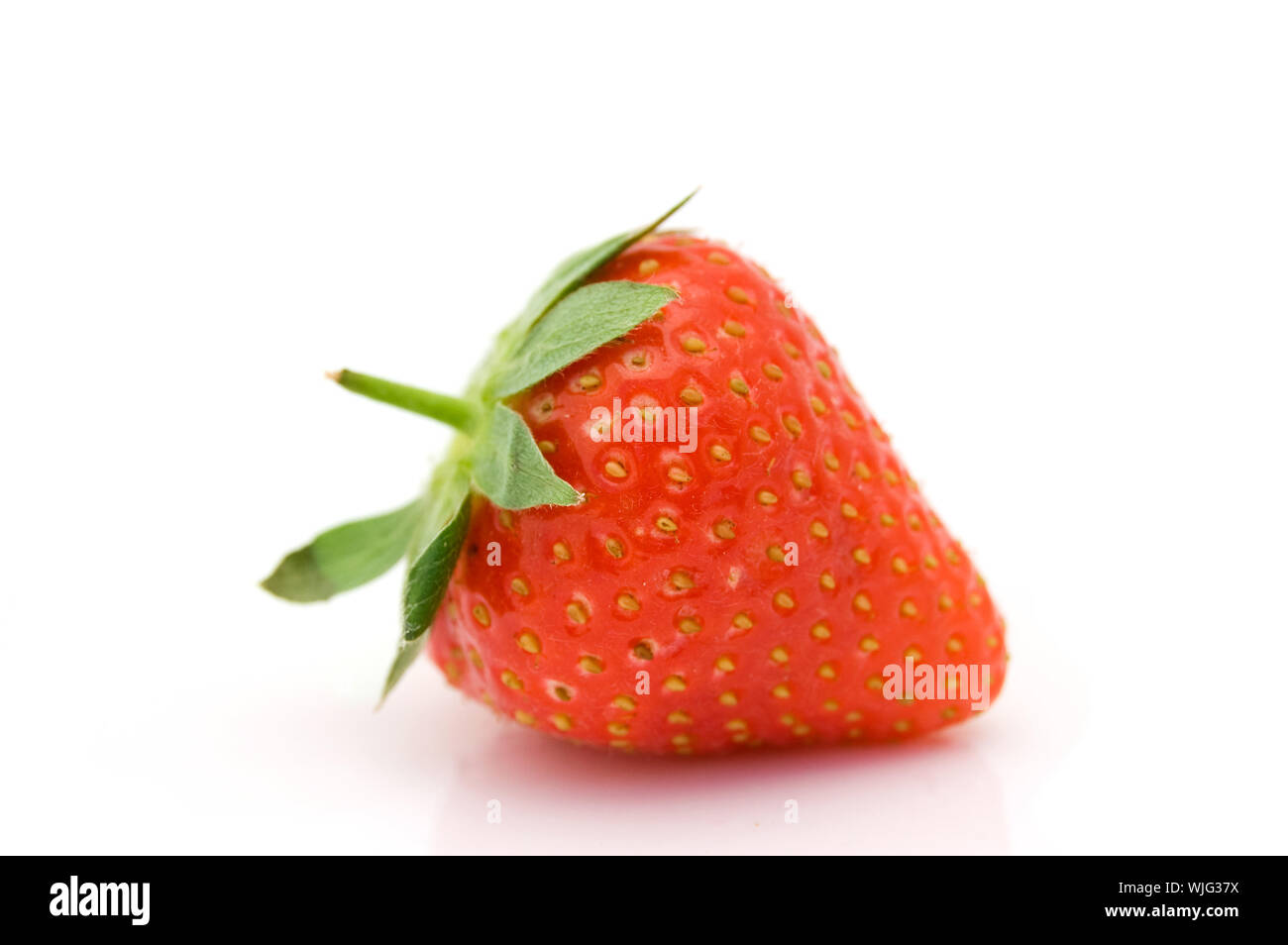A fresh strawberry isolated on a white background Stock Photo - Alamy