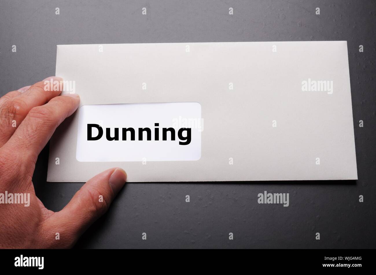 dunning or reminder concept with post letter and word Stock Photo