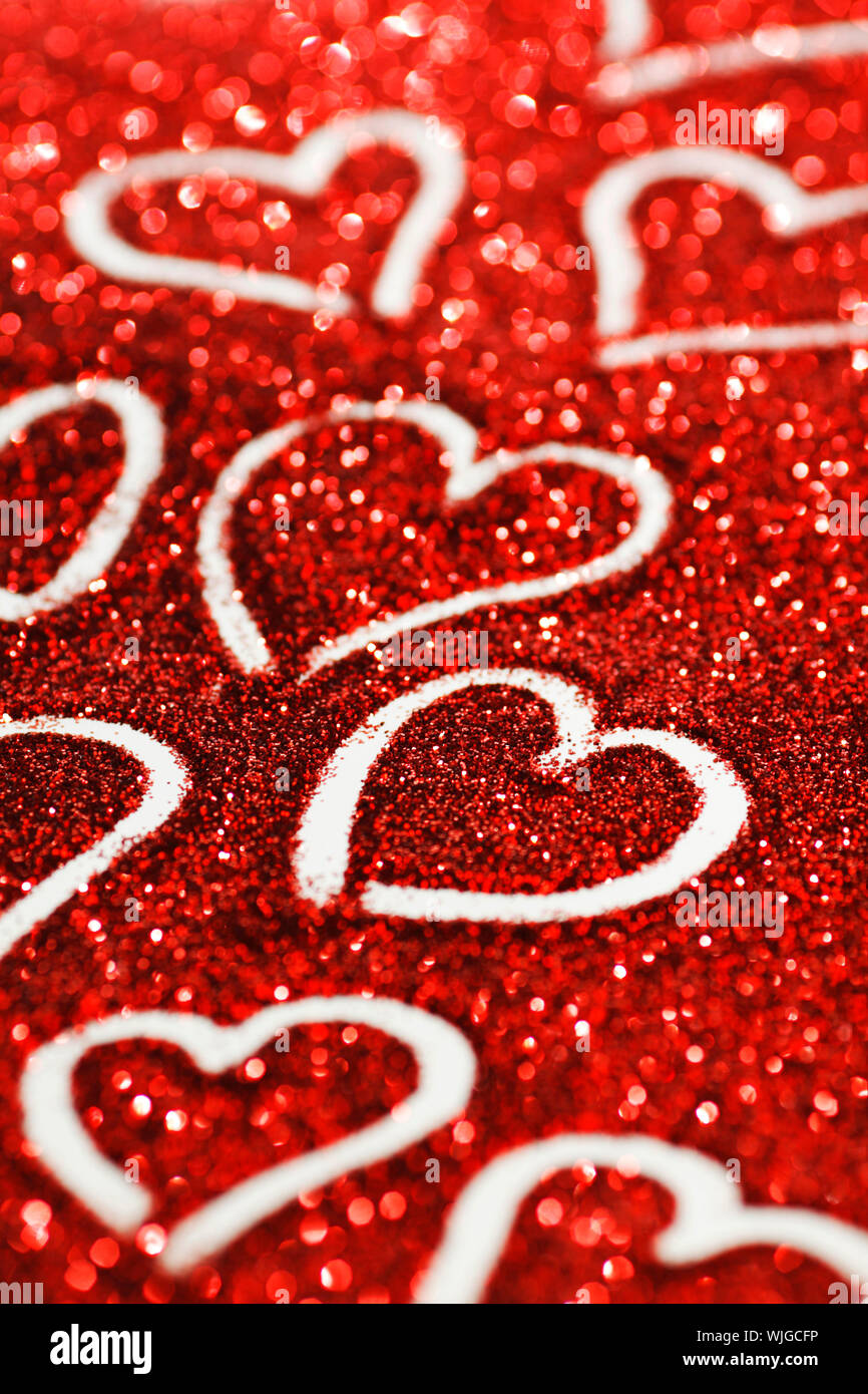 Red glitter Valentines day card with hearts Stock Photo - Alamy