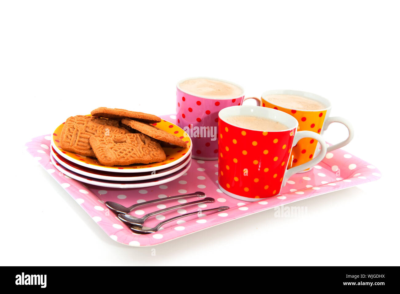 speckles cups and saucers on tray isolated over white Stock Photo