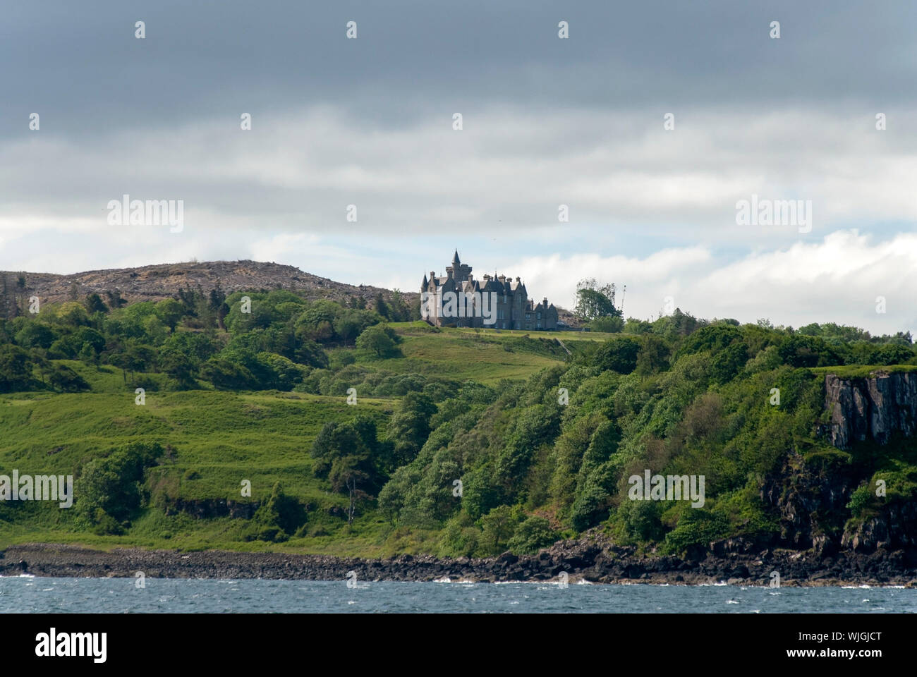 19th Century Glen Gorm Castle Mishnish Estate Isle of Mull Argyll & Bute Scotland United Kingdom exterior view from sound of mull 1860 Kinnear and Ped Stock Photo