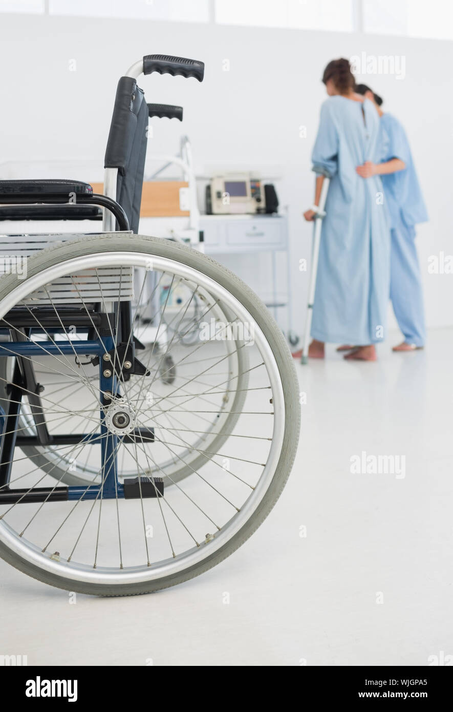 Rear view of woman in hospital gown hi-res stock photography and images ...