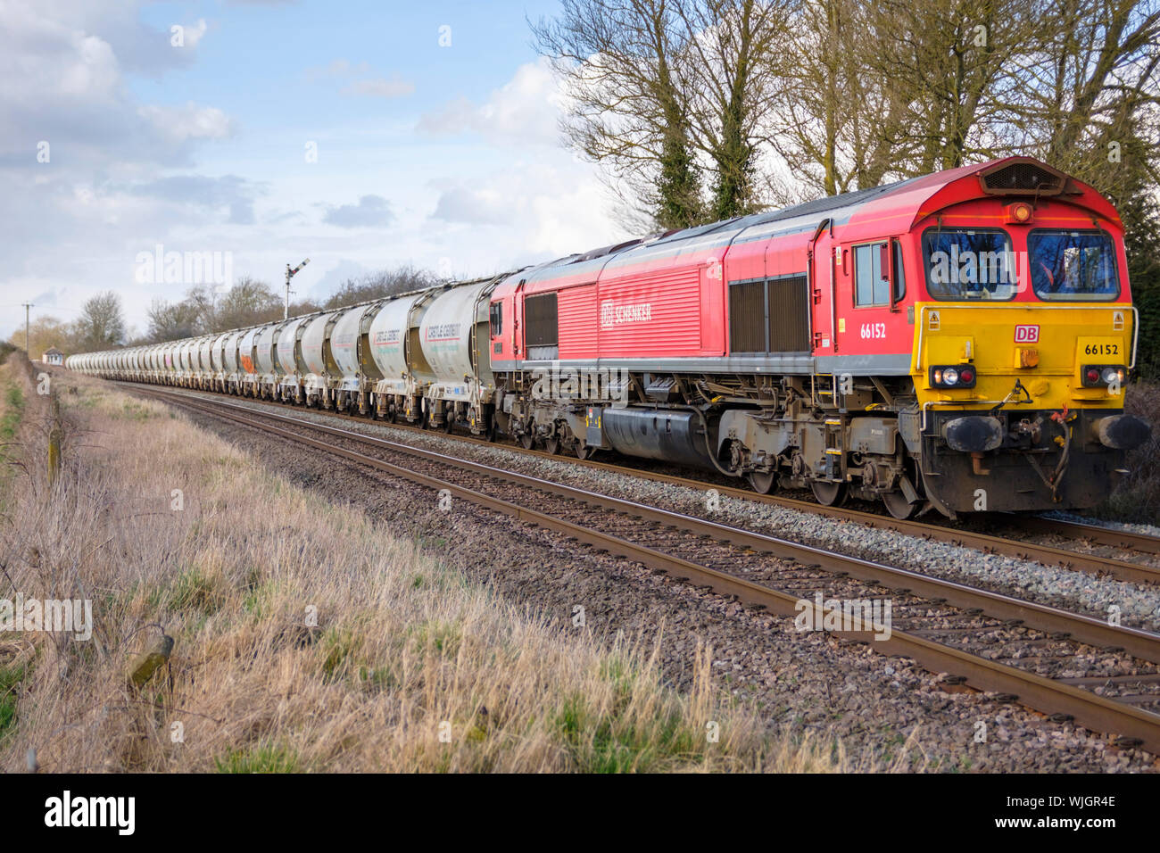 DB Schenker class 66 hauling Castle Cement wagons, between Melton Mowbray and Oakham uk Stock Photo