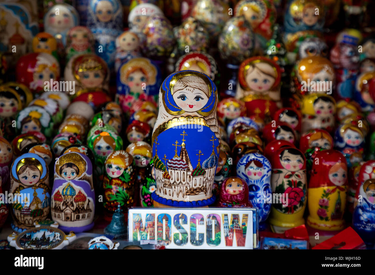 Russian Matreshka dolls in the range on the counter of a souvenir shop on Red Square in Moscow center, Russia Stock Photo