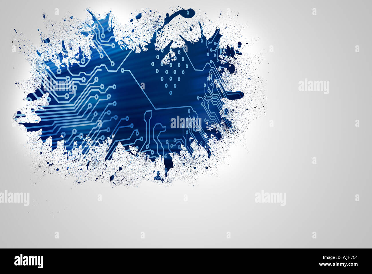 Splash on wall revealing circuit board Stock Photo
