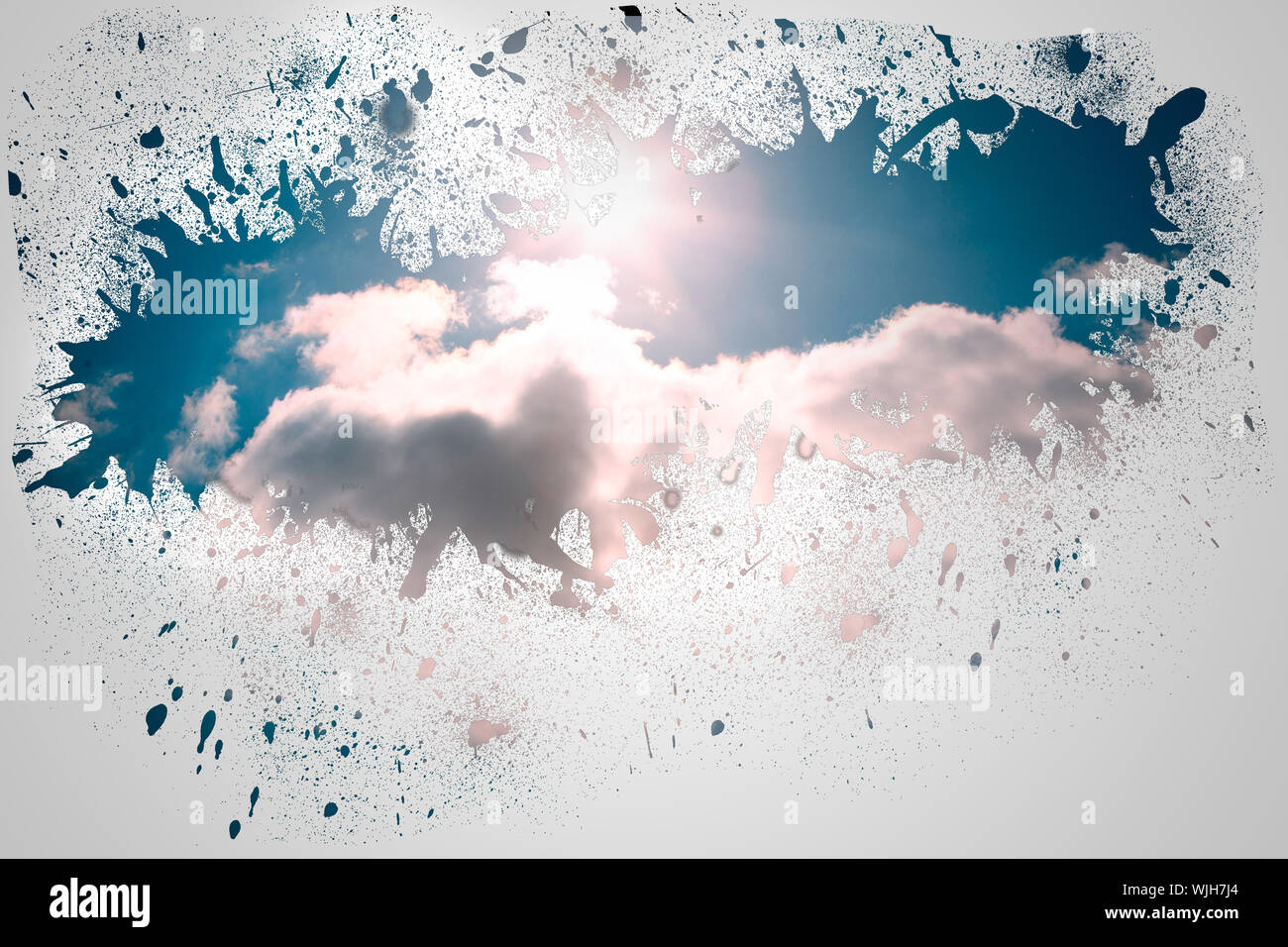 Splash on wall revealing cloud Stock Photo
