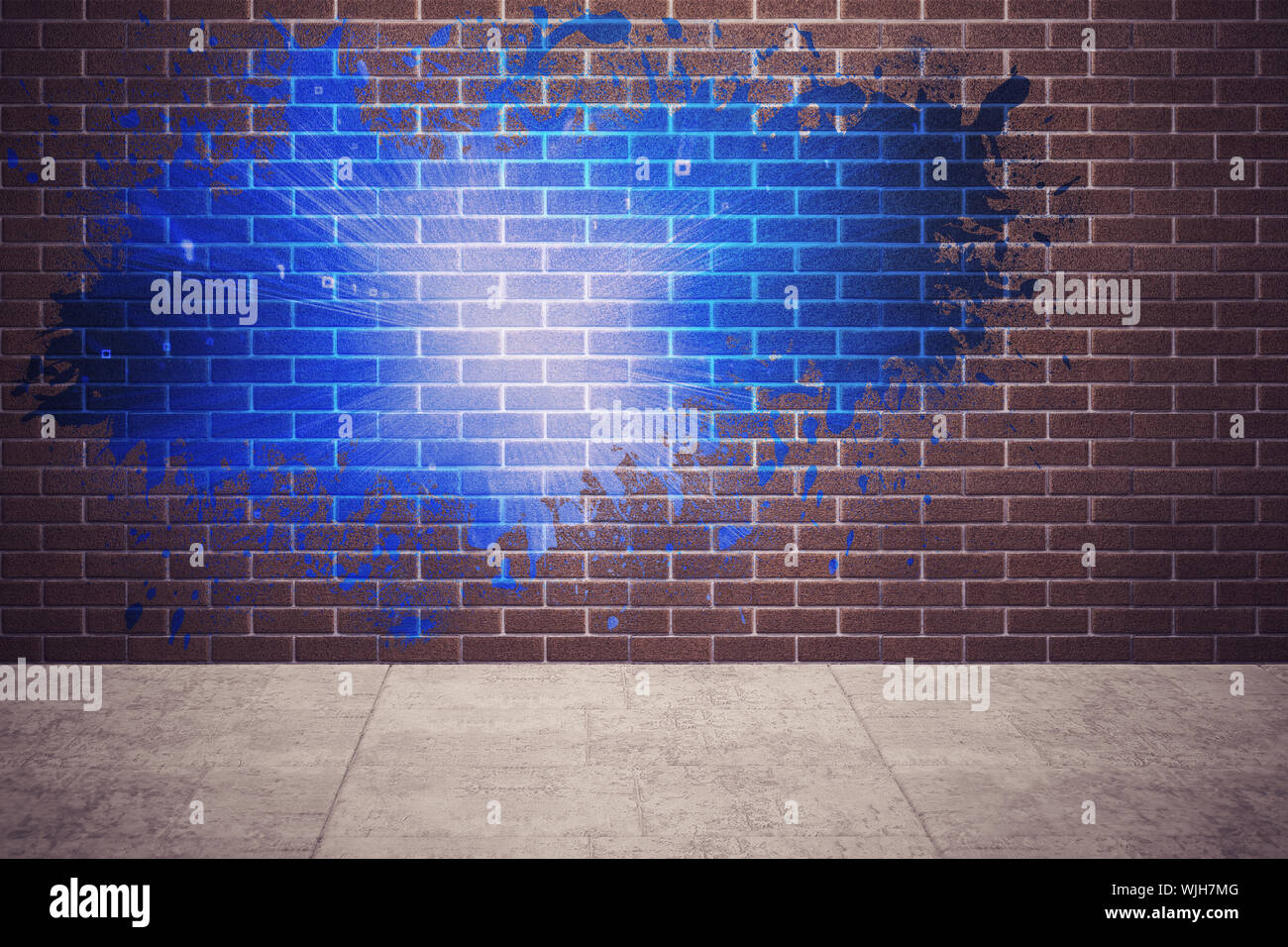 Splash on wall revealing blue light Stock Photo