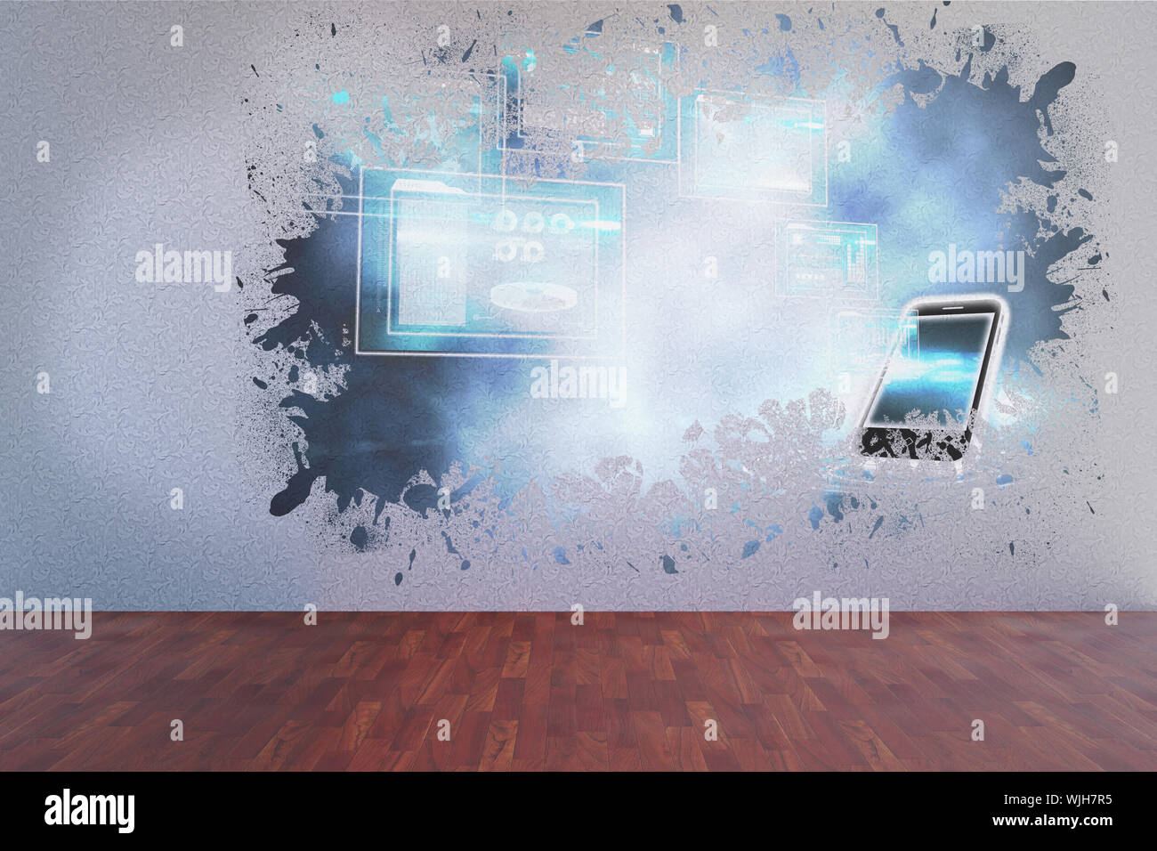 Splash on wall revealing technology interface Stock Photo