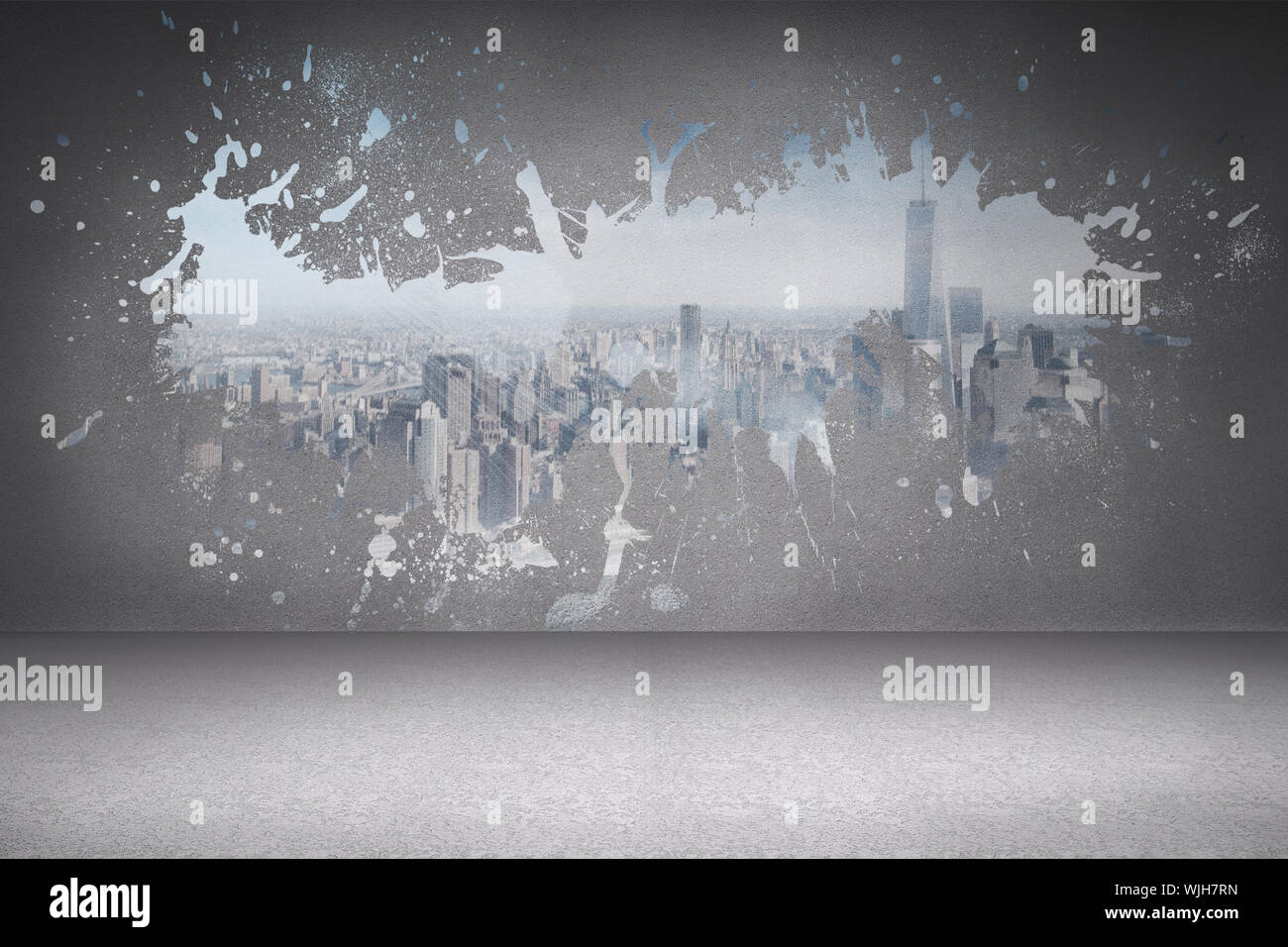 Splash on wall revealing cityscape Stock Photo
