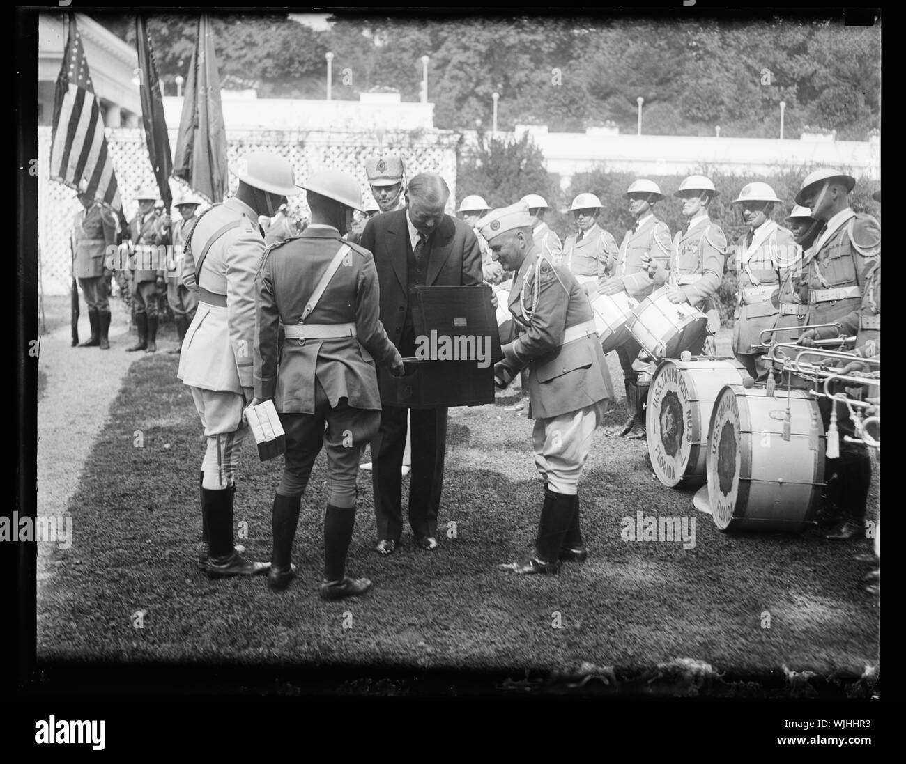 Herbert Hoover with marching band outside White House, Washington, D.C