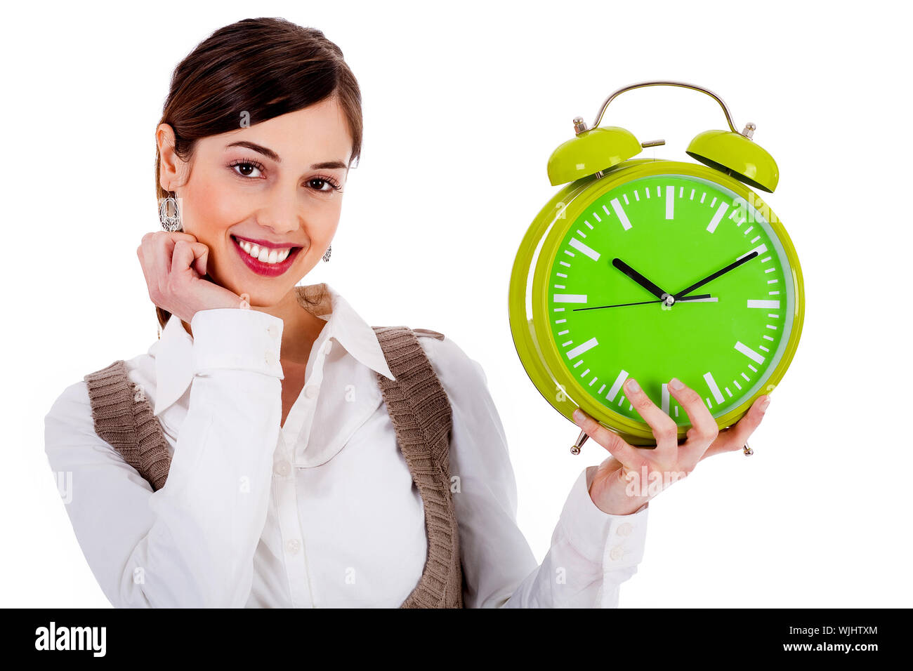 Portrait of lady holding alarm clock with one hand and one hand on chin