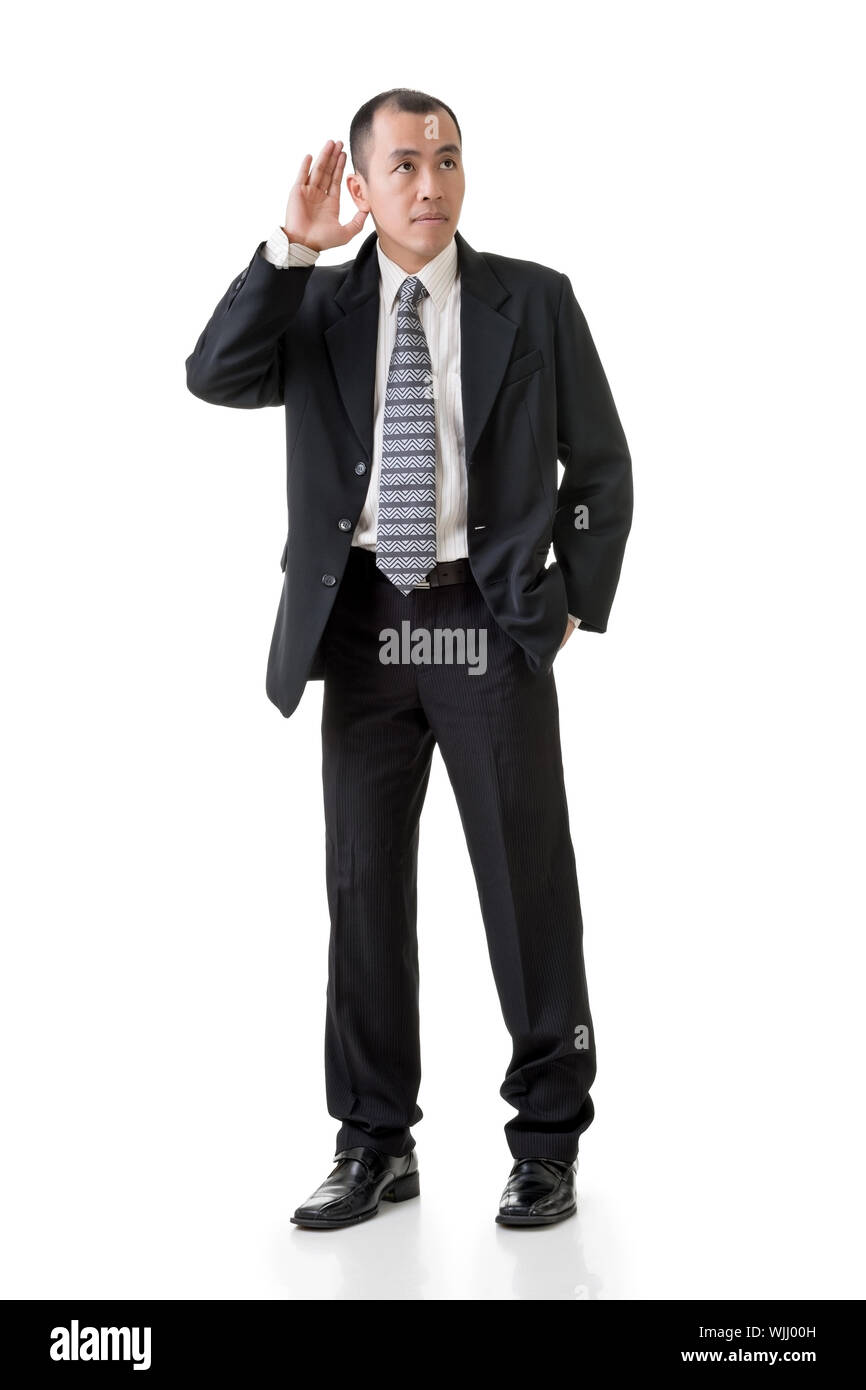 Mature Asian business man hear, full length portrait isolated on white ...