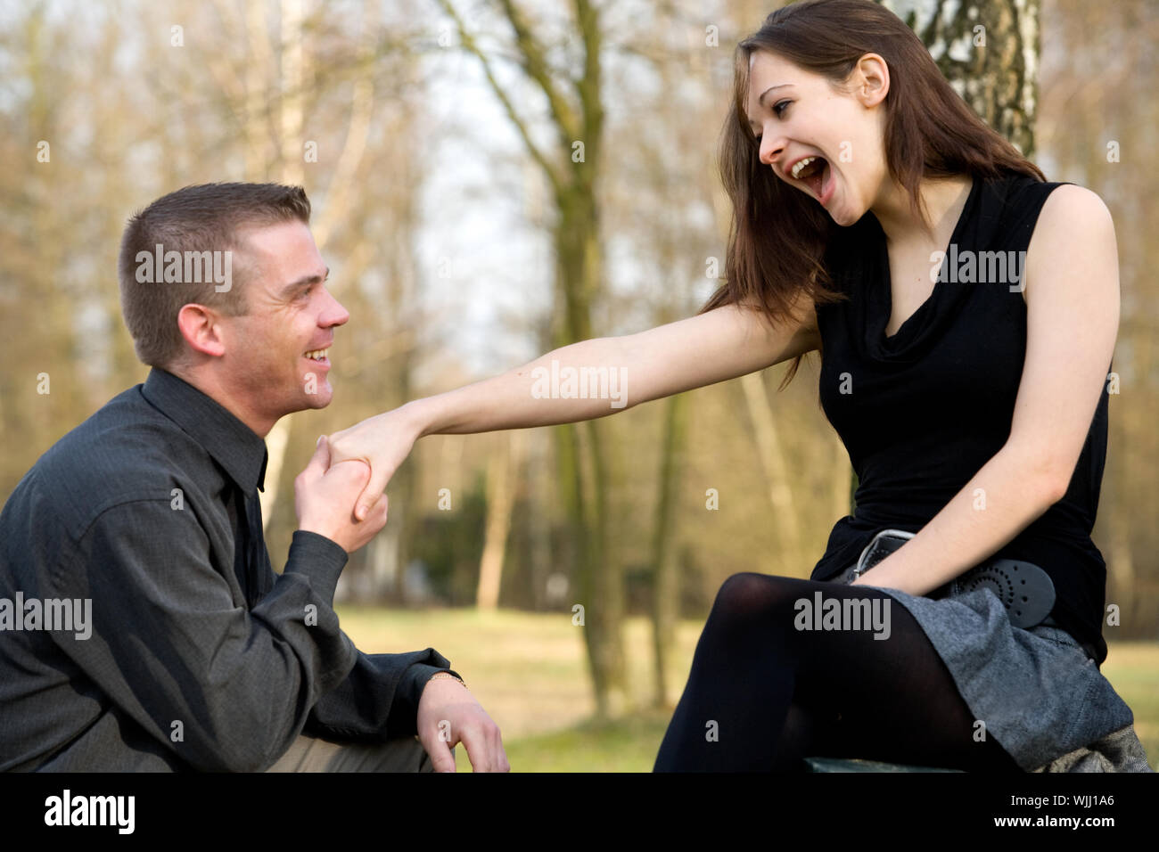 Man is asking his girlfriend to get married Stock Photo - Alamy