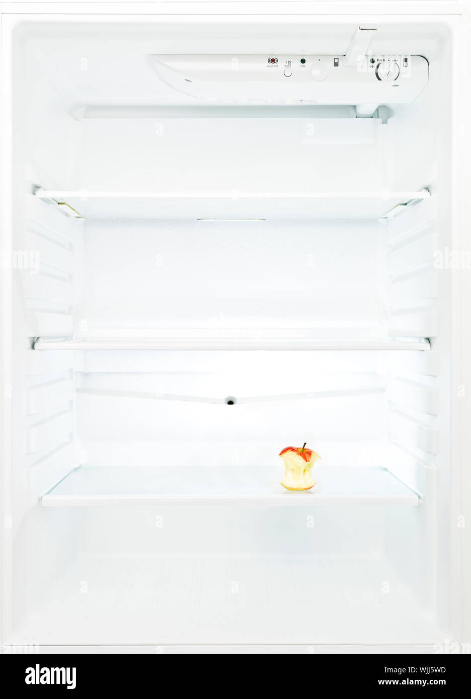 Half eaten apple in the Refrigerator Stock Photo Alamy