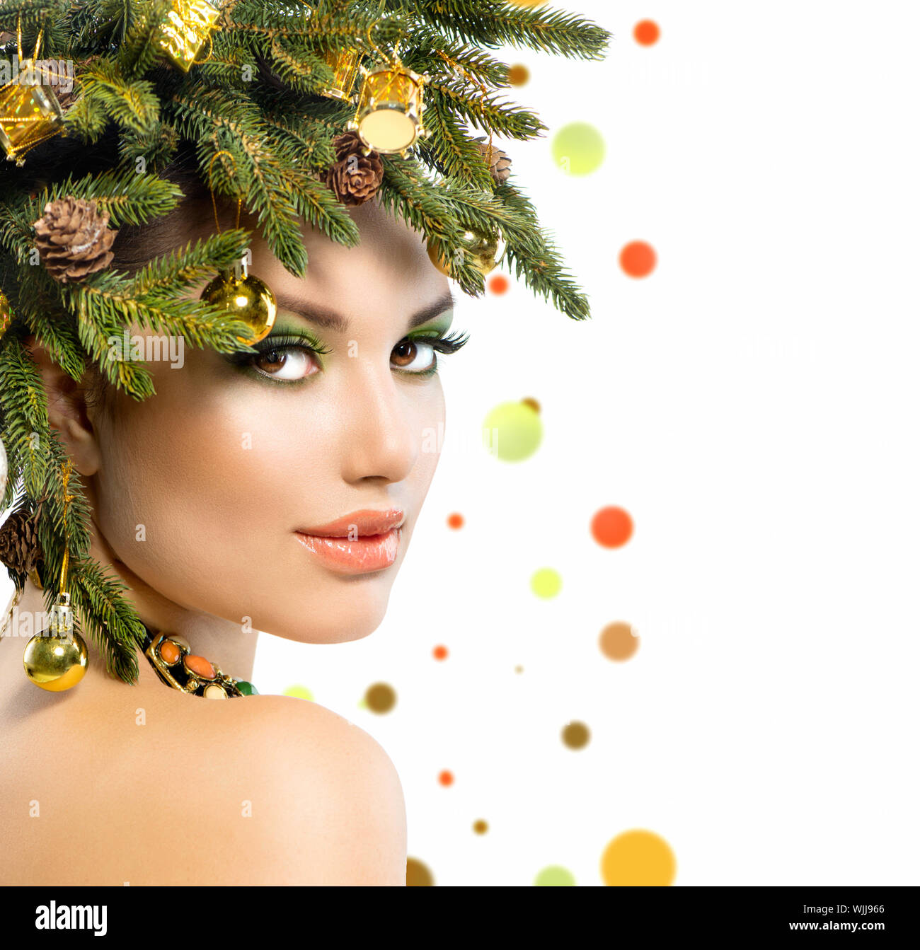 Christmas Woman. Christmas Holiday Hairstyle and Makeup Stock Photo - Alamy