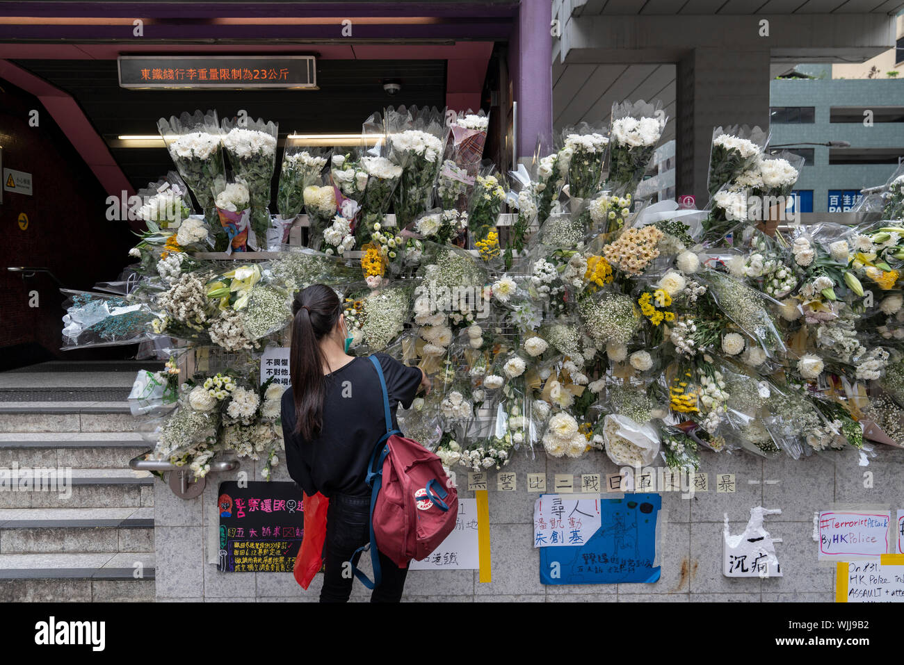 A commuter pays a tribute to the protesters who were injured and ...