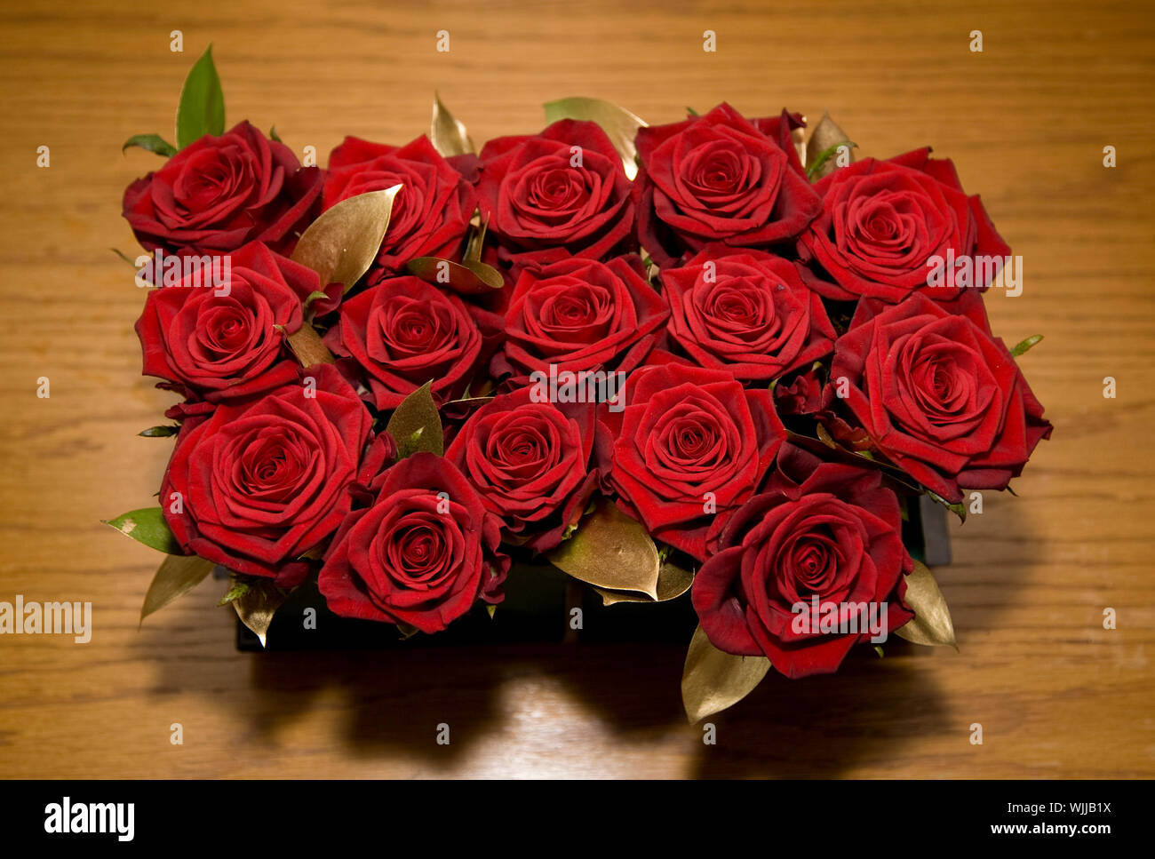 Red Roses for Button Holes grouped together Stock Photo