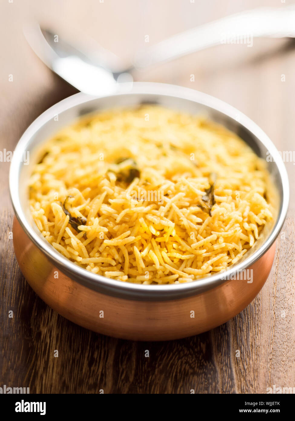 close up of a bowl of indian golden biryani rice Stock Photo Alamy