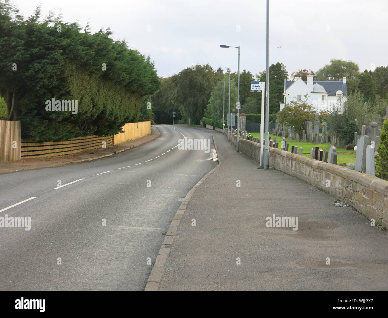 View of Boclair Road, the B8049, outside New Kilpatrick Cemetery