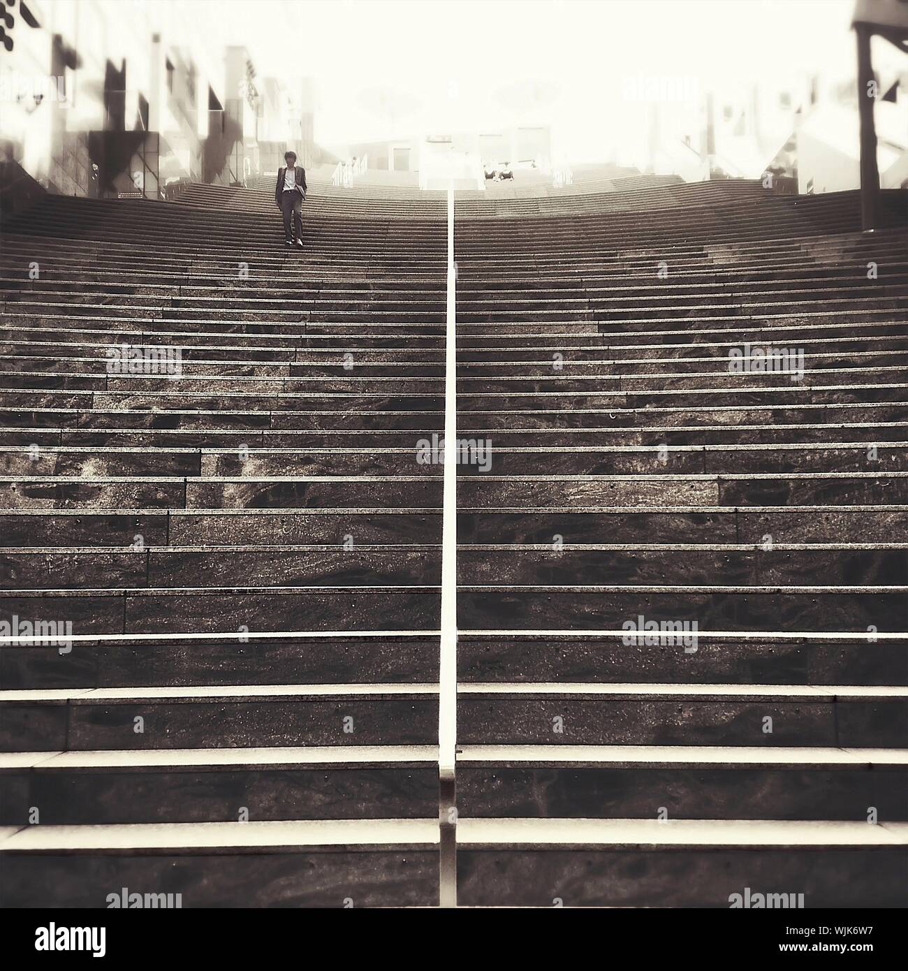 Stairs handrail man hi-res stock photography and images - Alamy