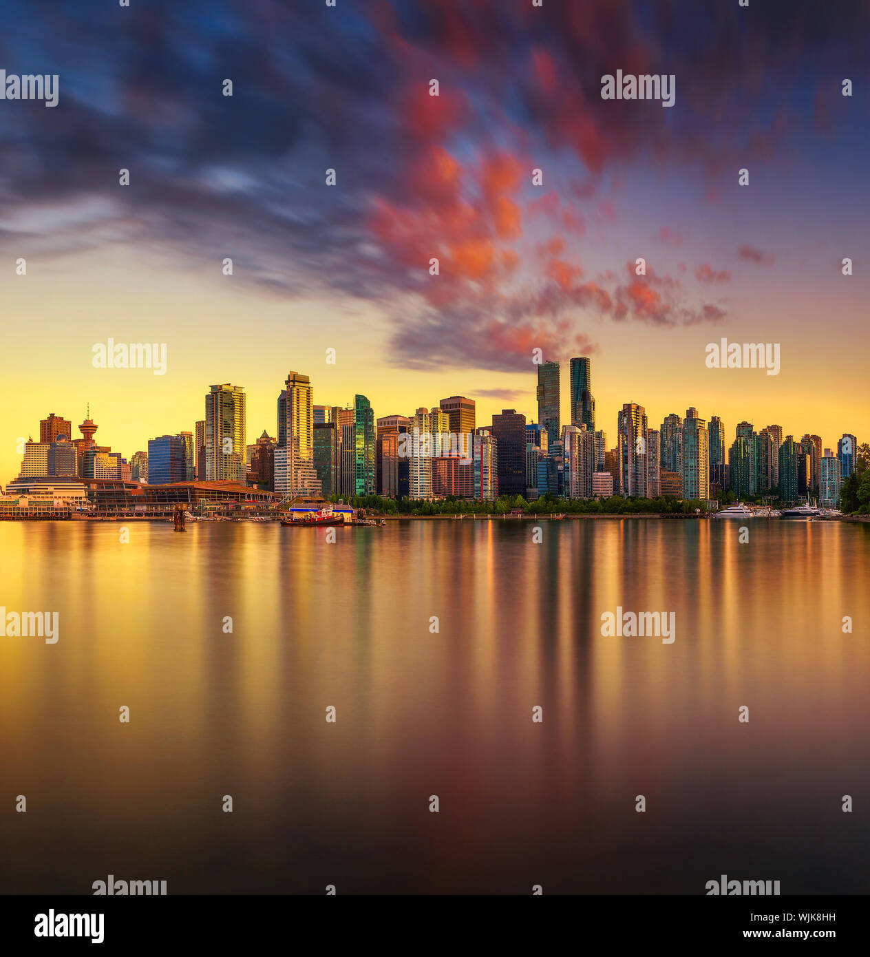 Sunset skyline of Vancouver downtown from Stanley Park Stock Photo