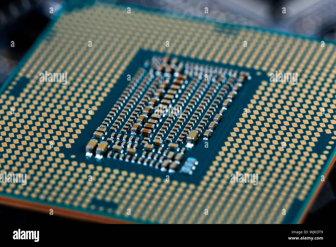 back side of modern lga 1151v2 central processor unit - closeup with  selective fcus and blur Stock Photo - Alamy