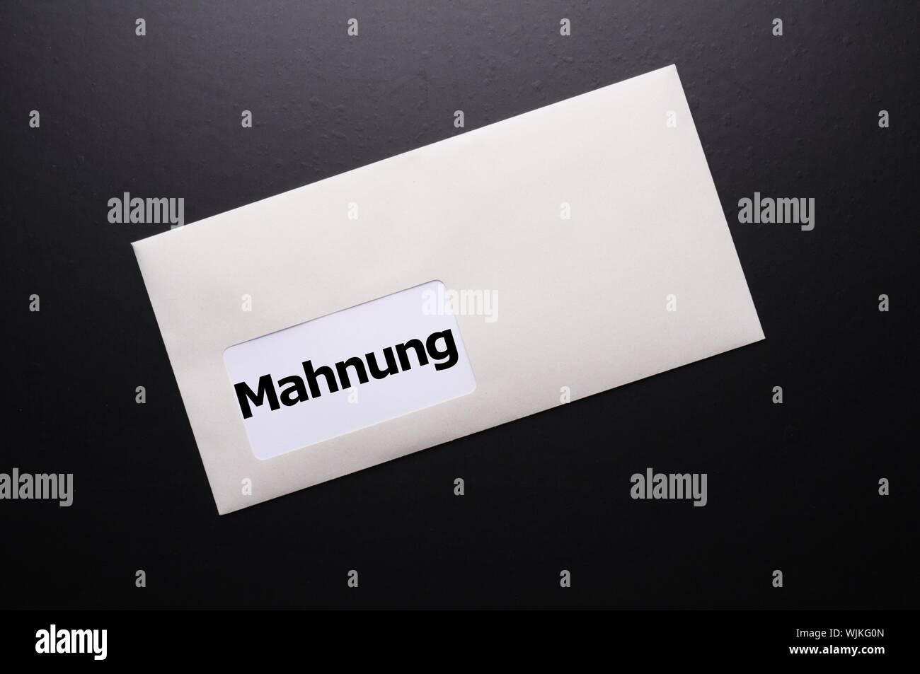 dunning or reminder concept with post letter and word Stock Photo