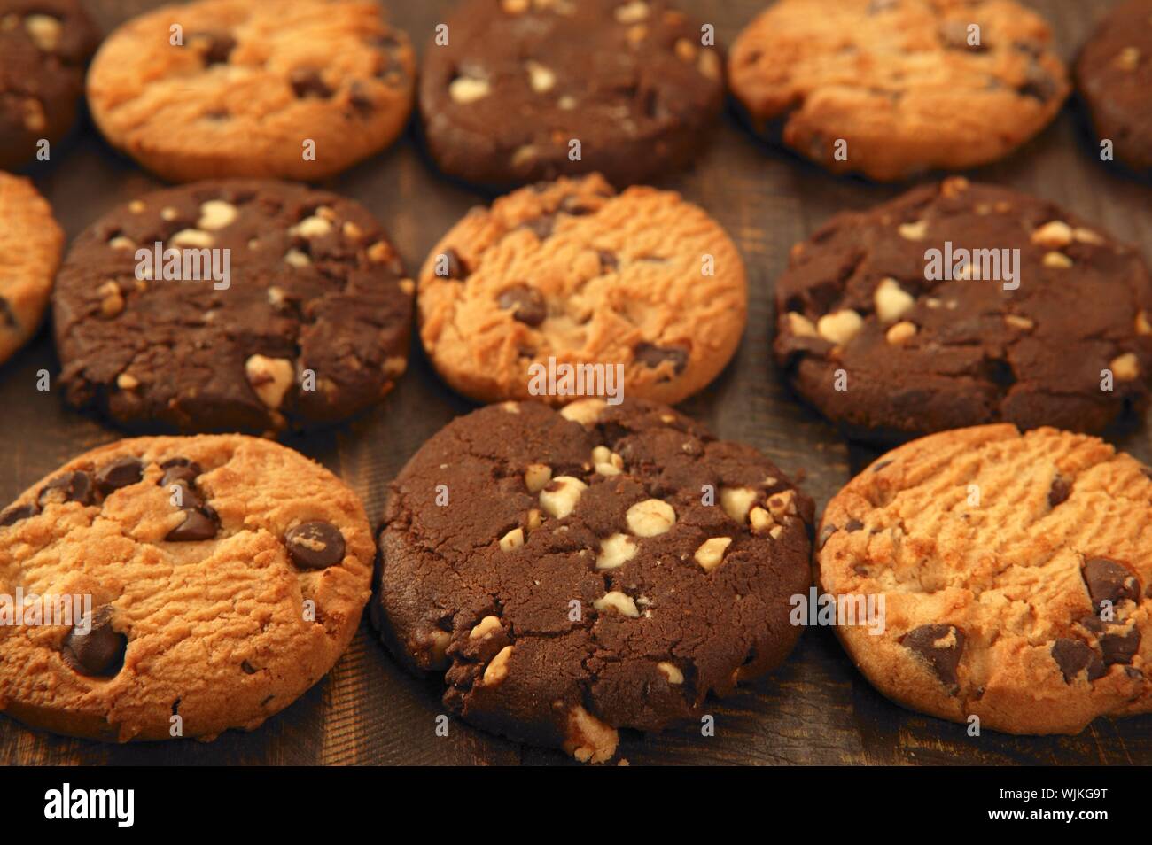 Chocolate cookie biscuits grid rows arrangement Stock Photo Alamy