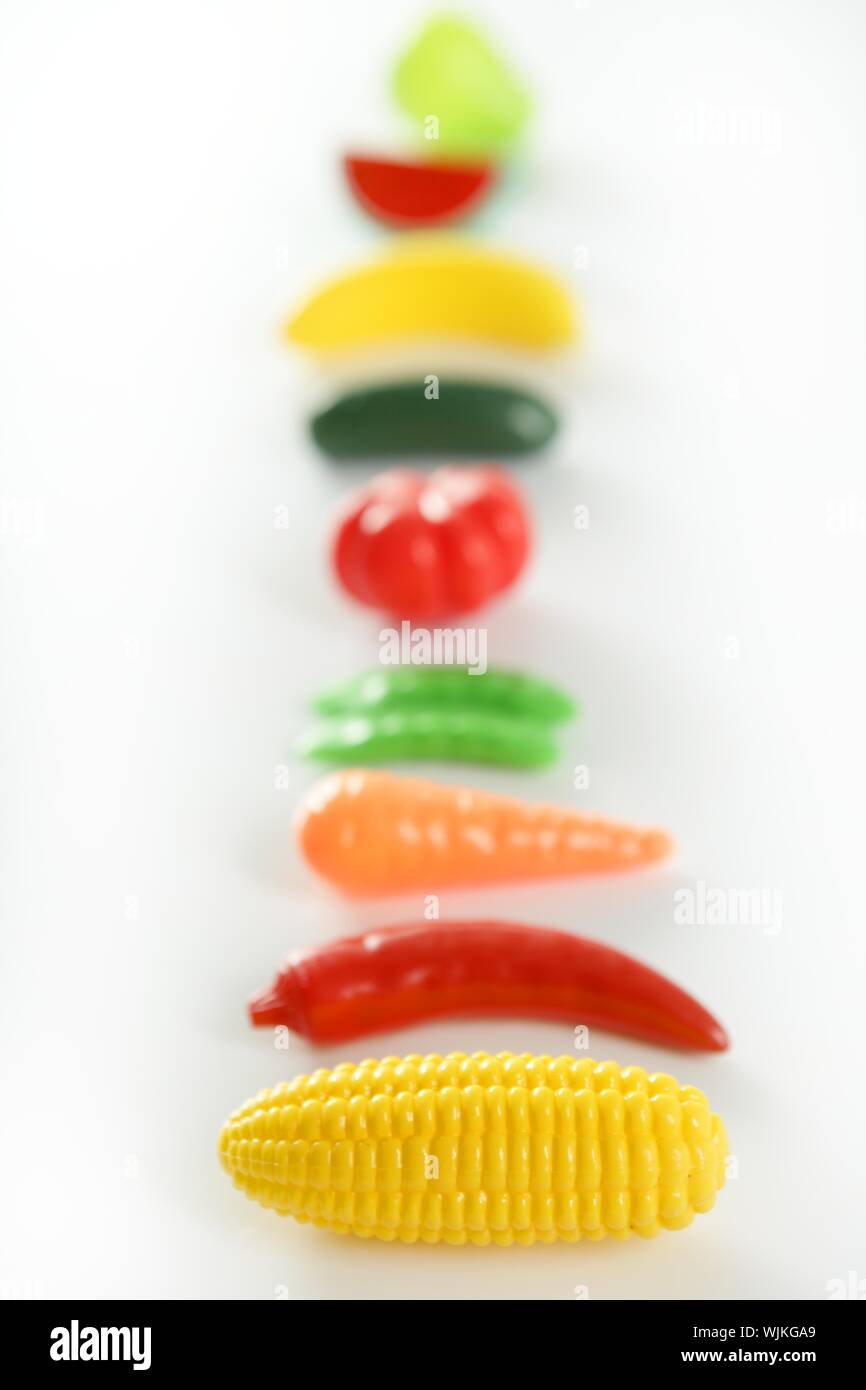 Plastic game, fake varied vegetables and fruits. Children food