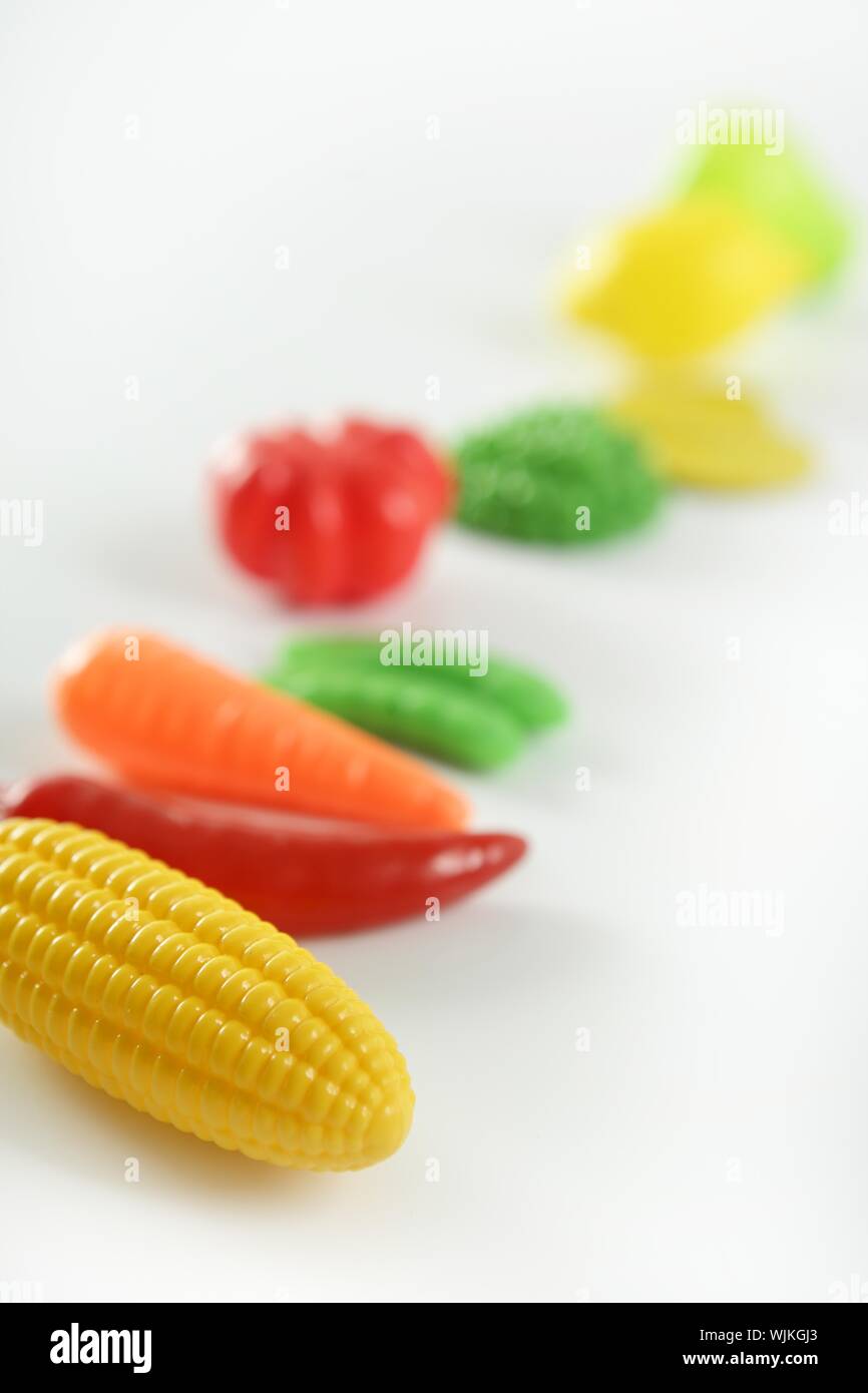 Plastic game, fake varied vegetables and fruits. Children food