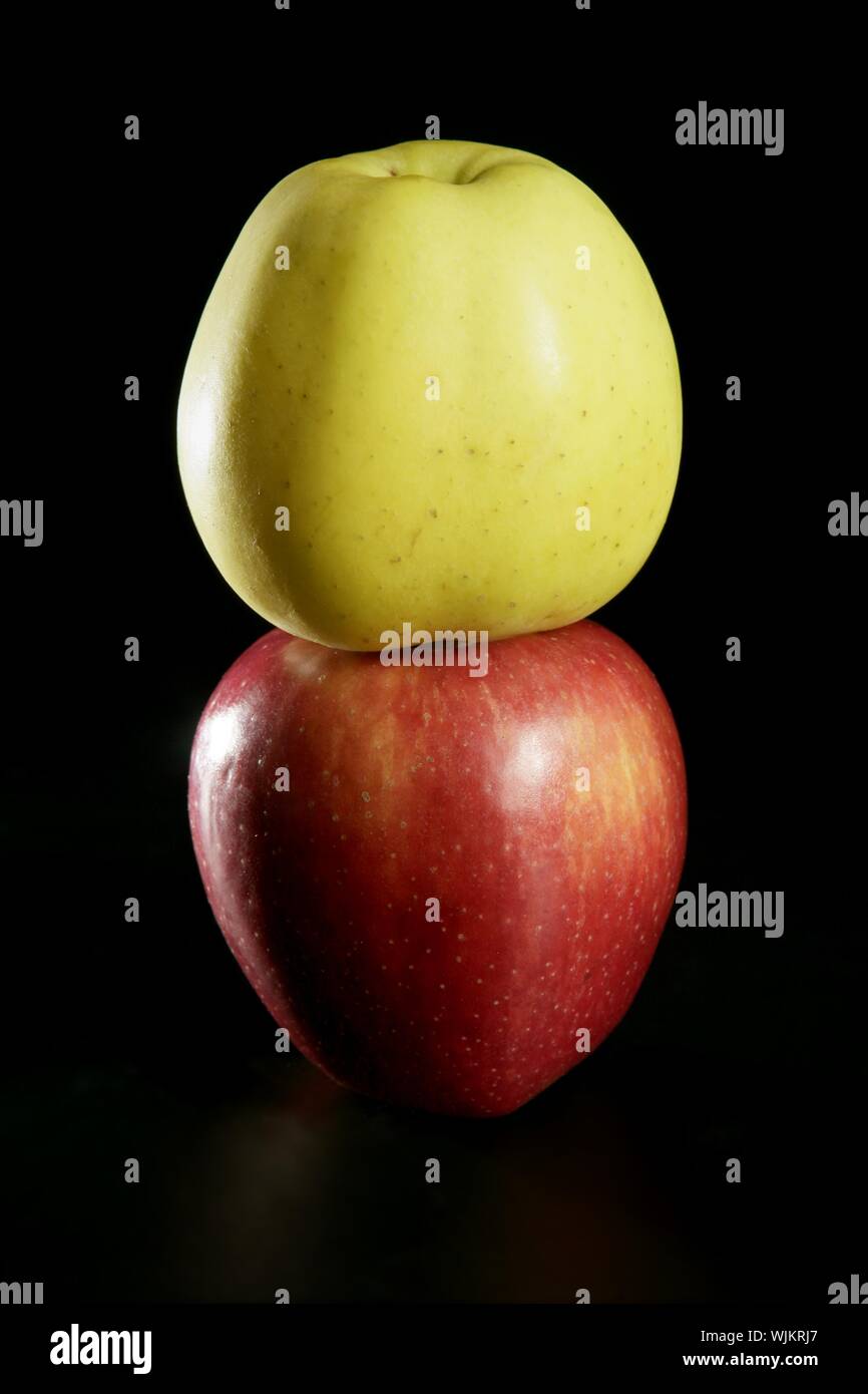 Apple fruit macro close up isolated over black studio background Stock