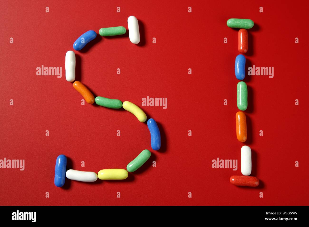 Candy Colorful Sweets Spelling The Word Yes In Spanish Si Stock Photo Alamy