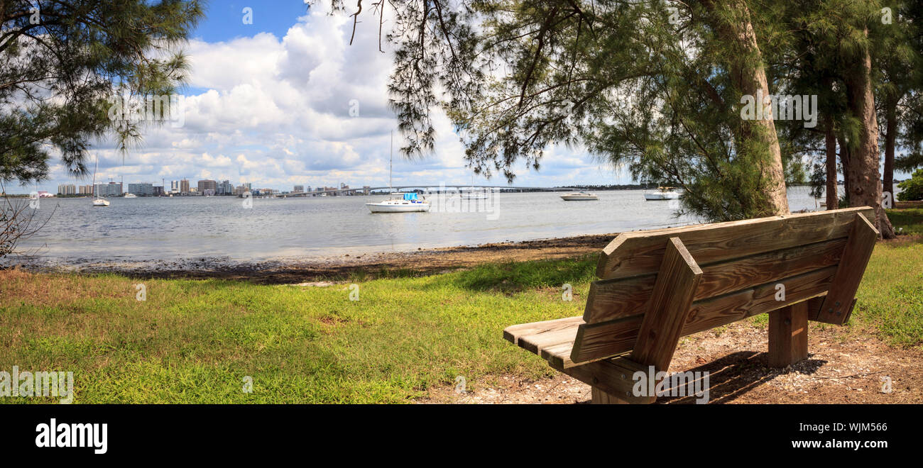Bench view of Boats at the Ken Thompson park in Sarasota, Florida Stock Photo