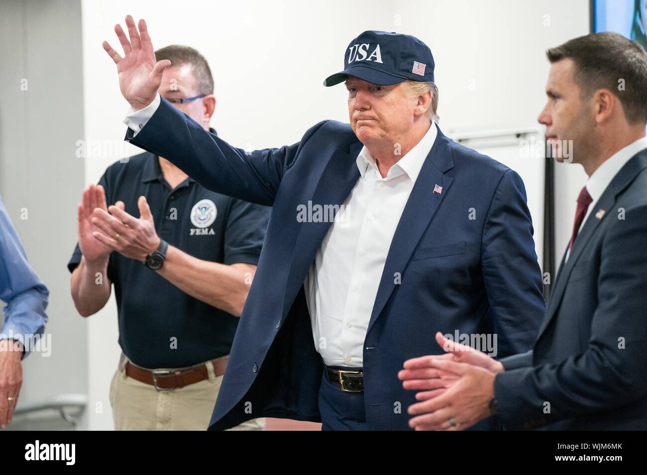 President Donald J. Trump, joined by Acting Secretary of the Department of Homeland Security Kevin McAleenan and Acting FEMA Administrator Pete Gaynor, attends a briefing Sunday, Sept. 1, 2019, on the current directional forecast of Hurricane Dorian at the Federal Emergency Management Agency (FEMA) headquarters in Washington, D.C, September, 2019. (Official White House Photo by Shealah Craighead) Image courtesy Sharon Pieczenik/Federal Emergency Management Agency. () Stock Photo