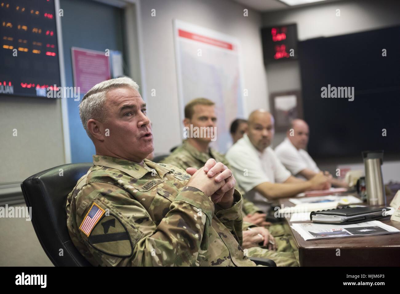 Maj. Gen. Richard Kaiser, U.S. Army Corps of Engineers (USACE) Deputy Commanding General and U.S. Army Deputy Chief of Engineers, participates in a telephonic briefing with teammates across USACE Sept. 1, 2019, to review the latest information on Hurricane Dorian in Washington, D.C. which is now a Category 5 system, September, 2019. USACE is mobilizing resources to four states: Florida, Georgia, South Carolina and North Carolina, where it has received mission assignments from the Federal Emergency Management Agency for temporary power and regional activation. USACE has deployed a flood-fight t Stock Photo