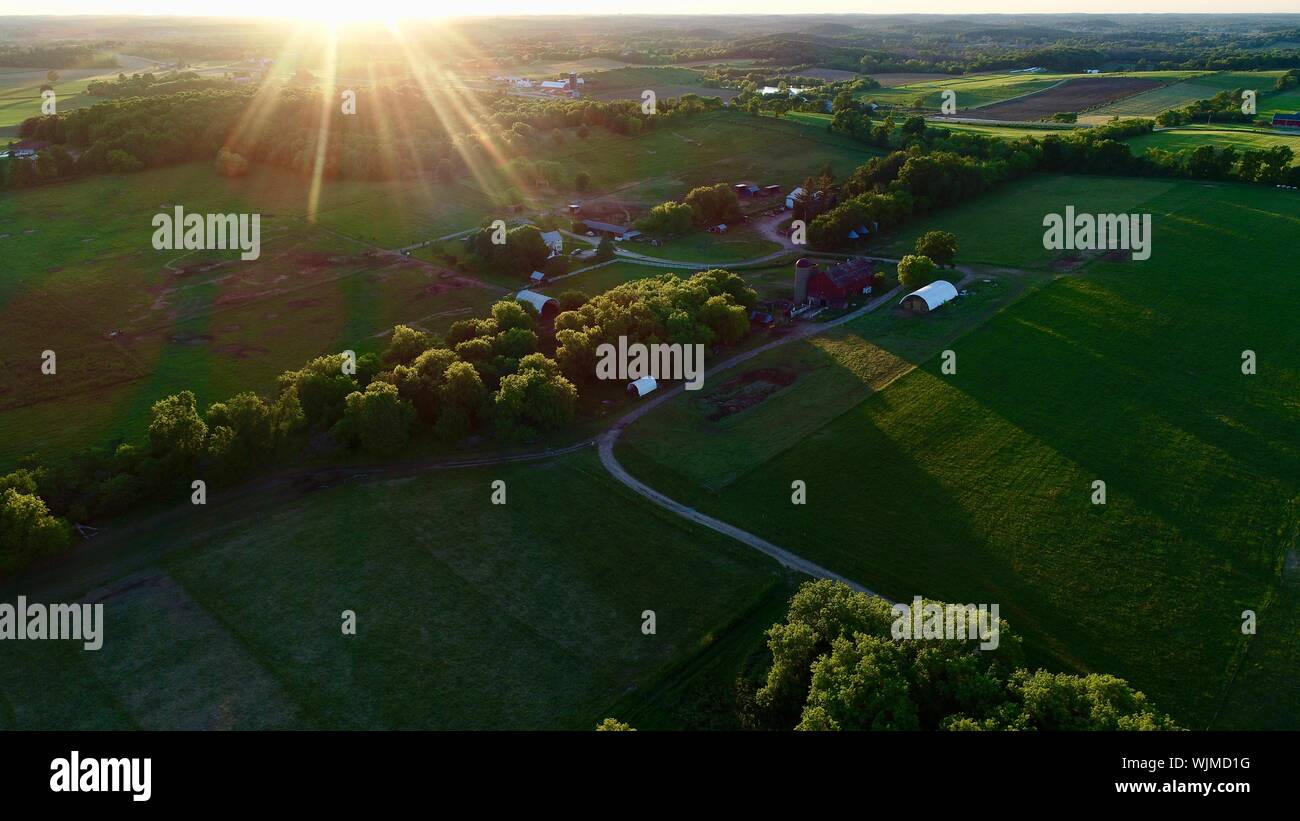 Aerial view at sunset over Brattset Family Farm, an organic beef farm ...