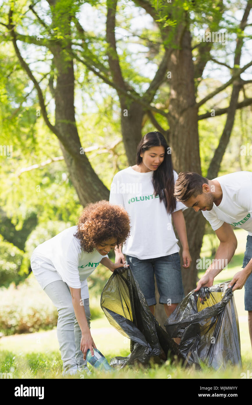 Female picking up litter park hi-res stock photography and images - Alamy