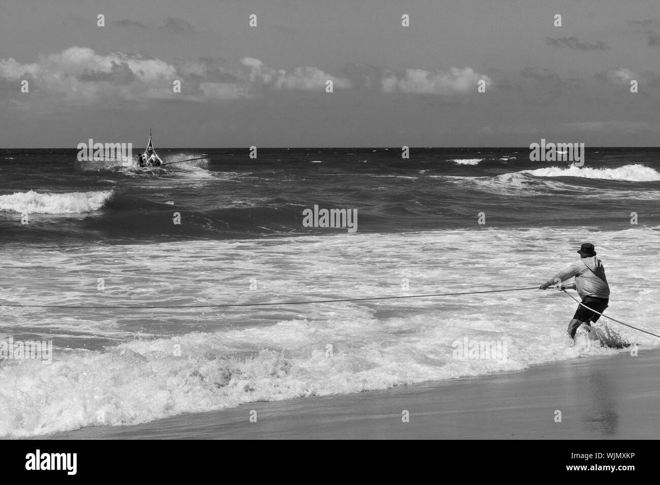 Rope pulling Black and White Stock Photos & Images - Alamy