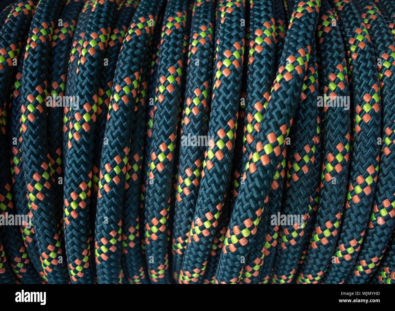 Blue yellow patterned rope reel. Close-up shot Stock Photo