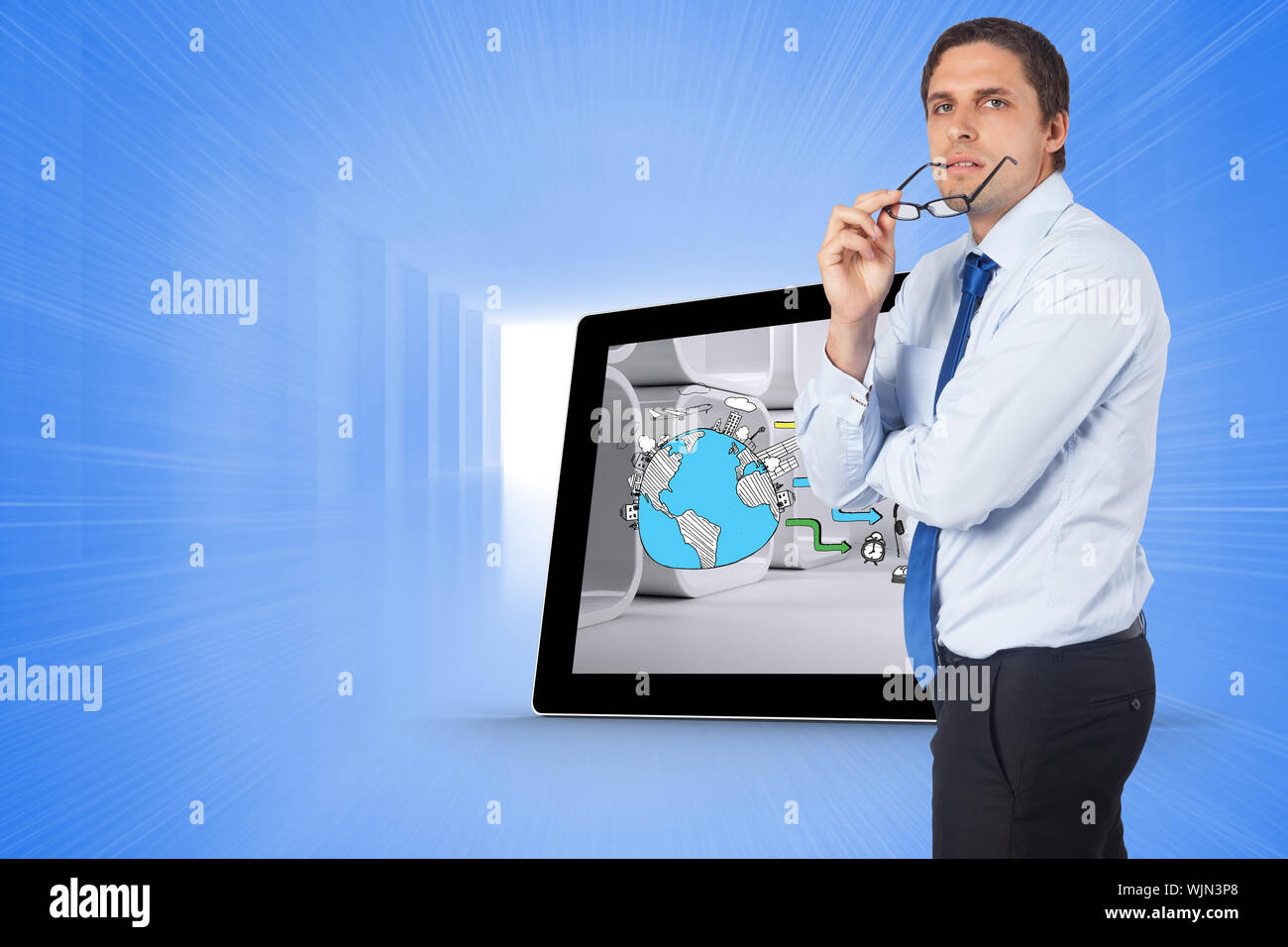 Thinking businessman biting glasses against bright blue room Stock Photo