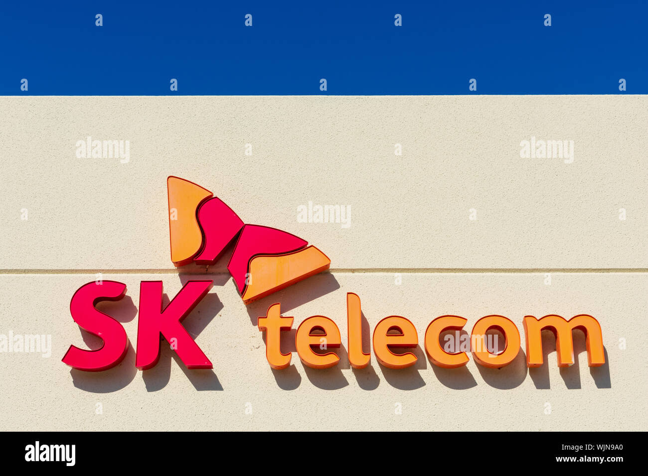 SK Telecom sign at the Korean telecom company office in Silicon Valley, high-tech hub of San Francisco Bay Area Stock Photo