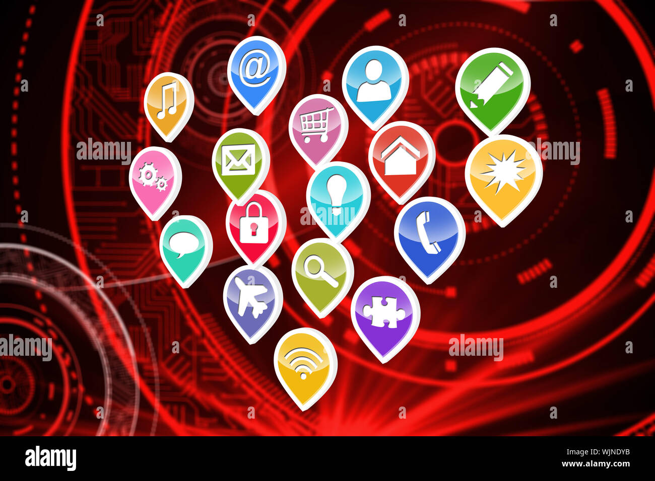Colourful computer applications against shiny red circles on black background Stock Photo