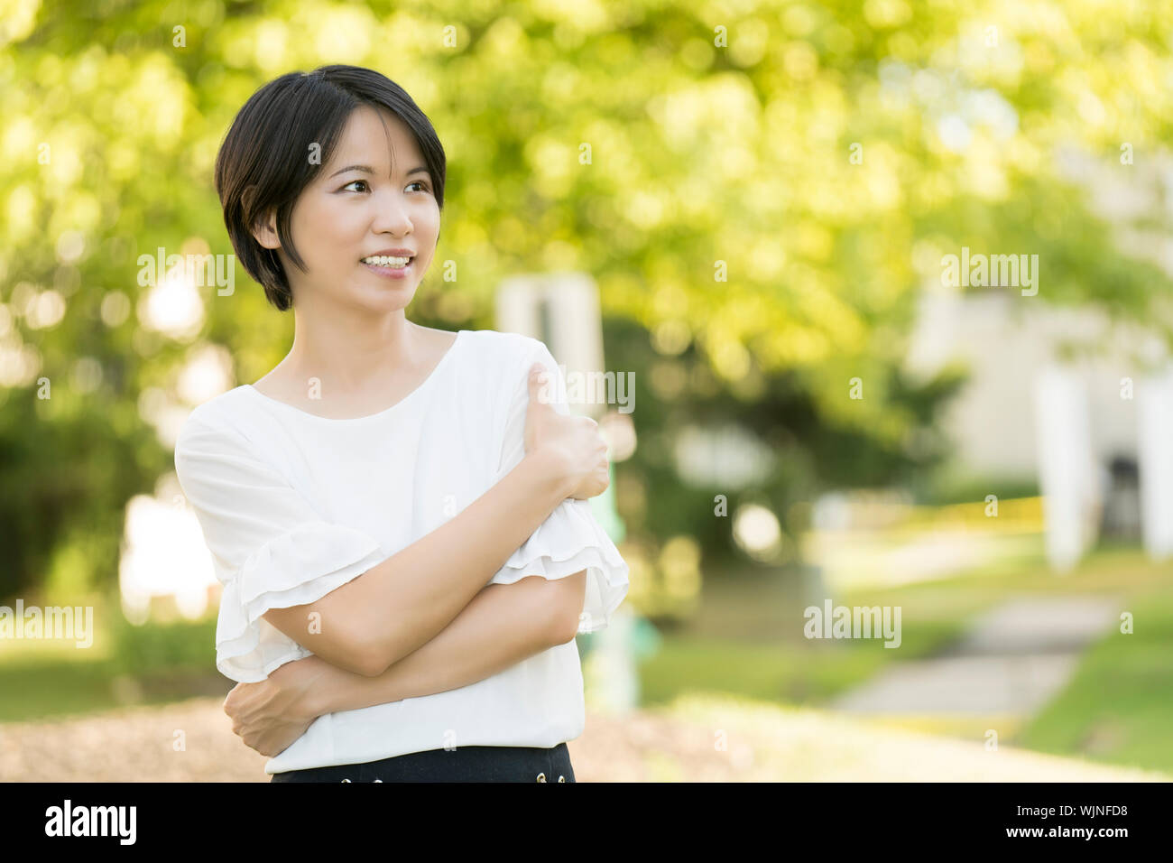 Portrait young woman outdoor back light Stock Photo