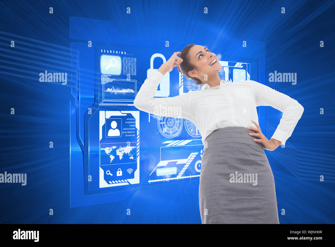 Smiling thoughtful businesswoman against shiny cogs on blue background Stock Photo