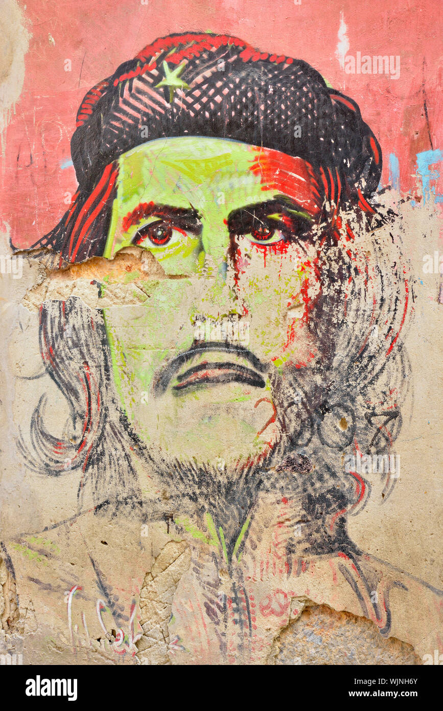 Street photography in Old Havana- Revolutionary wall art, La Habana (Havana), Habana, Cuba Stock Photo