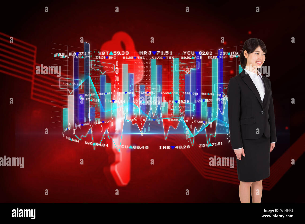 Smiling businesswoman against shiny red key on black background Stock Photo
