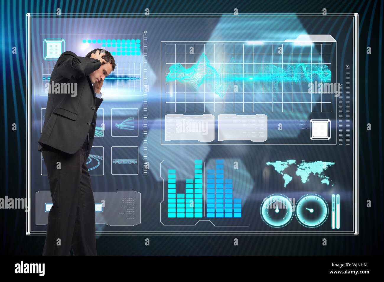 Stressed businessman with hands on head against shiny hexagons on black background Stock Photo