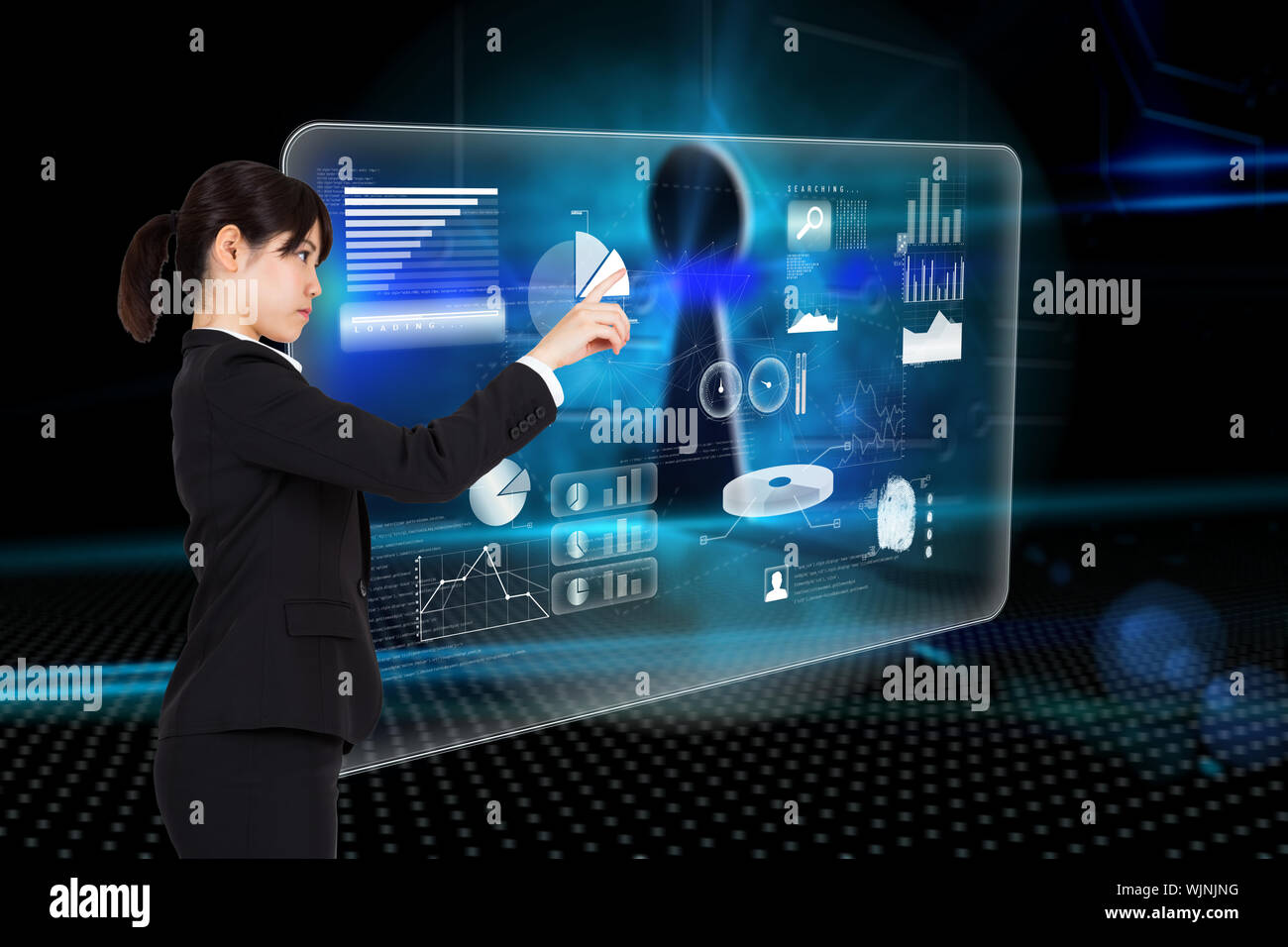 Serious businesswoman pointing against keyhole on technological background Stock Photo